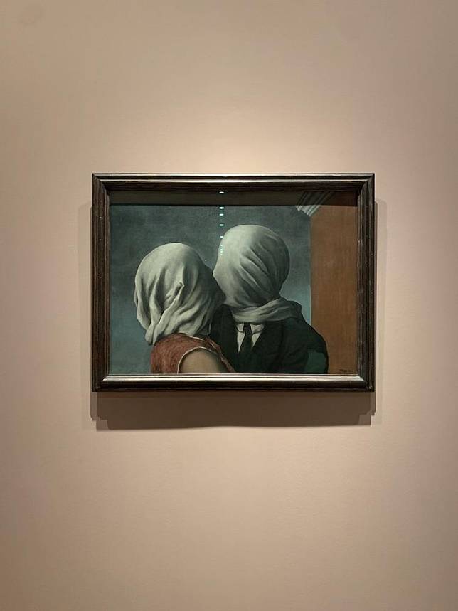 The Lovers (1928) by René Magritte
