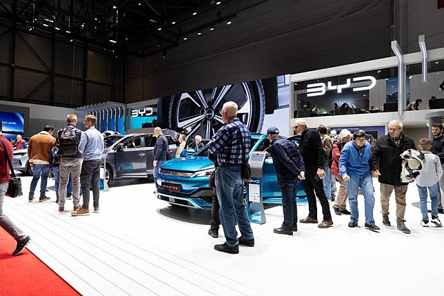 People visit the booth of BYD at the 91st Geneva International Motor Show in Geneva, Switzerland, Feb. 28, 2024. (Xinhua/Meng Dingbo)