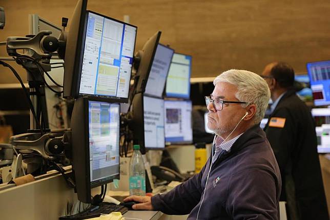 A trader works on the trading floor of the New York Stock Exchange (NYSE) in New York, the United States, on Aug. 21, 2024. (Xinhua/Liu Yanan)