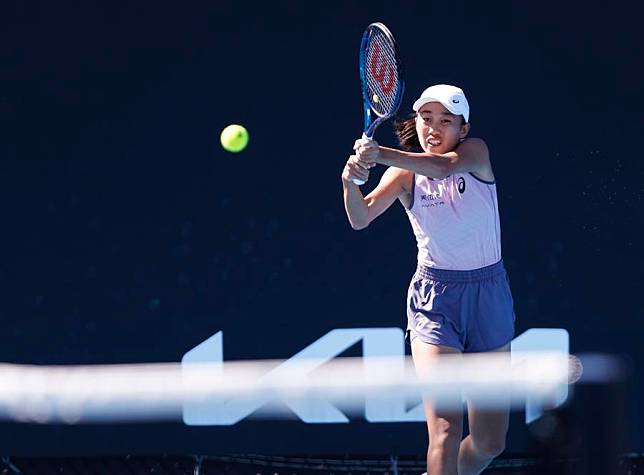 Zhang Shuai hits a return during the women's singles first-round match against McCartney Kessler of the United States at the Australian Open in Melbourne, Australia, on Jan. 14, 2025. (Xinhua/Ma Ping)