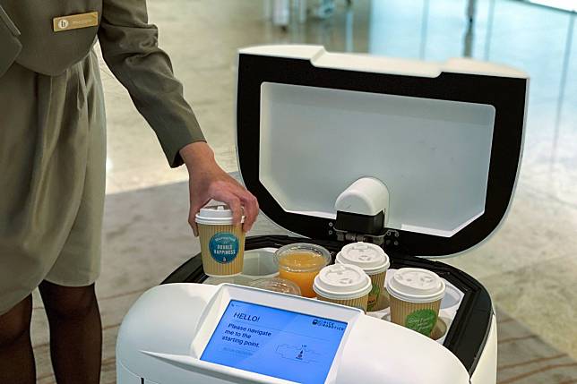 A Genie robot is already serving 130 to 150 meals a day at L’hotel Island South in Wong Chuk Hang. The hotel will have three such robots by mid-April. Photo: Handout