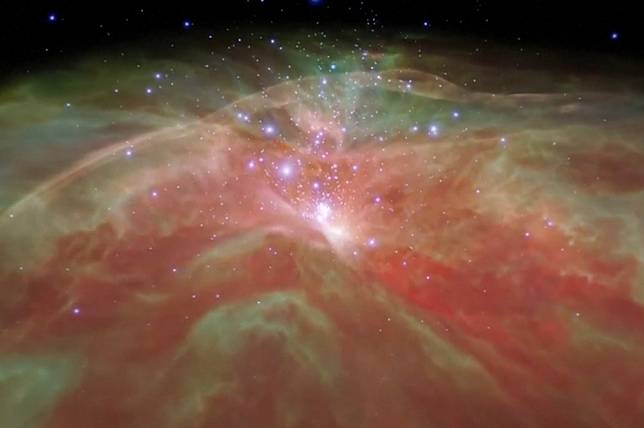 美國太空總署（NASA）對照哈伯望遠鏡和史匹哲太空望遠鏡的數據資料和圖片，製作出令人著迷的獵戶座星雲影片。（湯森路透）