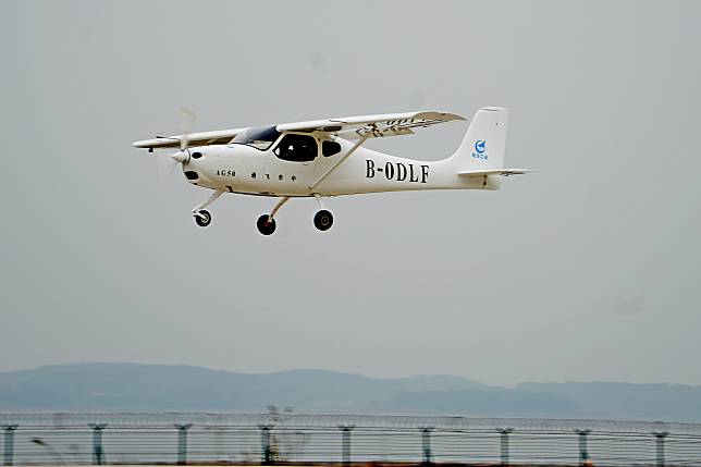 A modified AG50 conducts the maiden flight at an airport in Jingmen, central China's Hubei Province, Dec. 9, 2024. (AVIC/Handout via Xinhua)