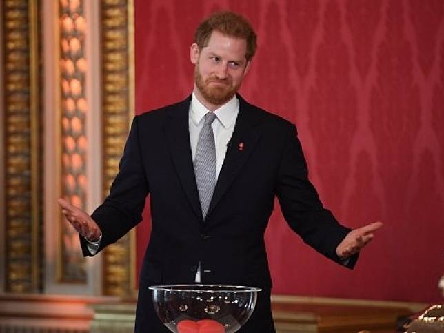 哈里王子宣布退位英國高級王室成員身份後首度出席活動。(法新社)