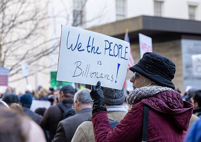 People attend a protest in support of the U.S. Consumer Financial Protection Bureau (CFPB) at the CFPB headquarters in Washington D.C., the United States, Feb. 10, 2025. (Xinhua/Hu Yousong)