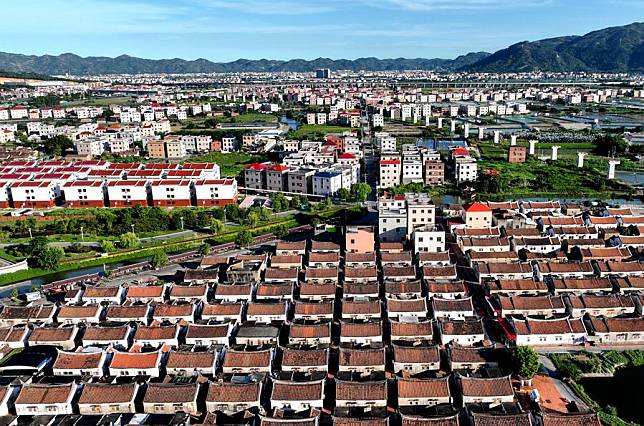 An aerial drone photo taken on July 10, 2024 shows a view of Daimei Village in Longhai District of Zhangzhou City, southeast China's Fujian Province. (Xinhua/Wei Peiquan)