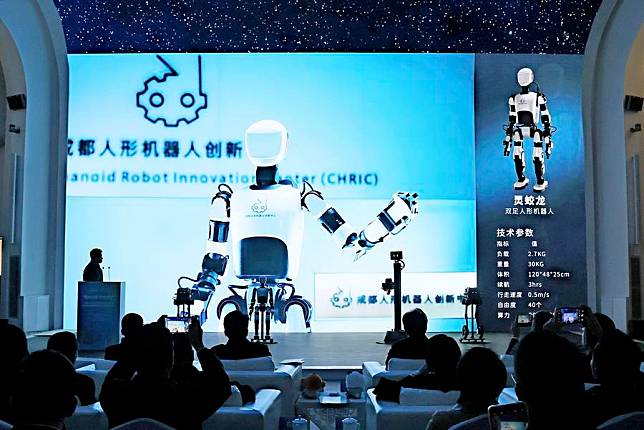 A bipedal humanoid robot is presented at a press conference in Chengdu, southwest China's Sichuan Province on Dec. 27, 2024. (Chengdu municipal bureau of economy and information technology/Handout via Xinhua)