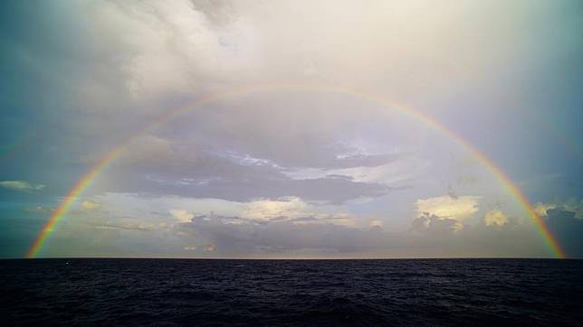 This photo taken on May 3, 2024 shows a view with a rainbow in the sky of the South China Sea. (Xinhua/Yuan Shuai)