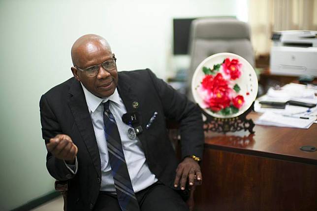 Lennox Andrews, Grenada's minister for economic development, planning, agriculture and lands, forestry, marine resources and cooperatives, speaks during an interview with Xinhua in St. George's, Grenada, Jan. 6, 2025. (Xinhua/Zhao Kai)