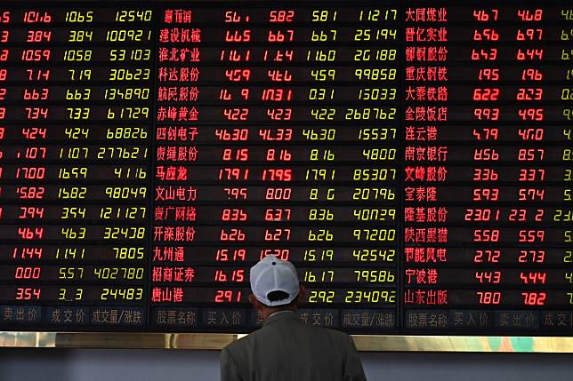 An investors monitors stock price movements at a securities company in Shanghai on May 8, 2019. Photo: Agence France-Presse