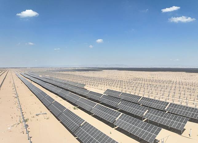 An aerial drone photo taken on Sept. 10, 2024 shows photovoltaic power facilities in Dengkou County, Bayannur City, north China's Inner Mongolia Autonomous Region. (Xinhua/Li Yunping)