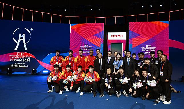China and South Korea teams pose for group photo after the men's team final at the 2024 ITTF World Team Table Tennis Championships Finals in Busan, South Korea, Feb. 25, 2024. (Xinhua/Tao Xiyi)