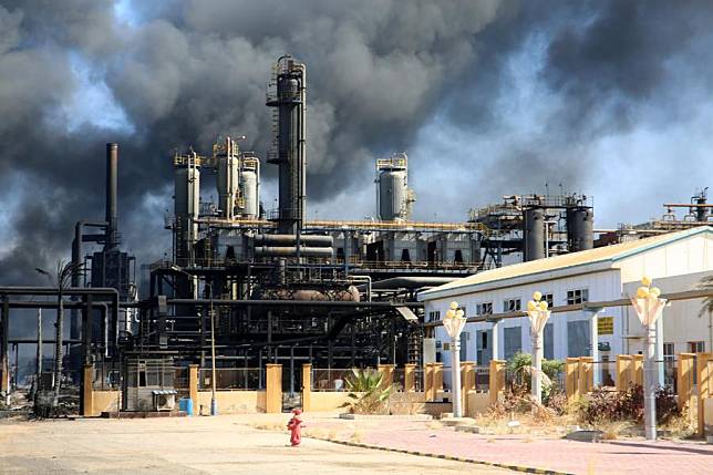 This photo taken on Jan. 26, 2025 shows a thick cloud of smoke from a massive fire at the Khartoum Oil Refinery in Al-Jaili area, north of the Sudanese capital Khartoum. (Photo by Mohamed Khidir/Xinhua)