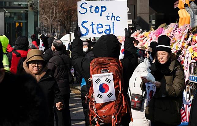 Supporters of impeached South Korean President Yoon Suk-yeol gather in a rally near the presidential residence in Seoul, South Korea, Jan. 12, 2025. (Photo by Jun Hyosang/Xinhua)