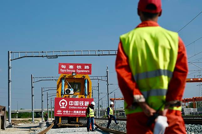 Construction workers of the Belgrade-Budapest railway project work on the tracks on the Novi Sad-Subotica section in Sajlovo, Serbia, on April 11, 2024. Once operational, the high-speed railway will be equipped with modern signaling and safety systems, significantly reducing travel time between the two cities. (Xinhua/Zheng Kaijun)