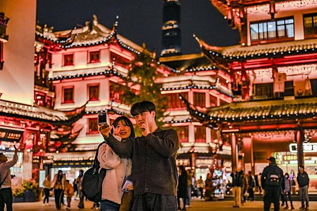 Tourists from the Republic of Korea (ROK) visit the Yuyuan Garden Mall in east China's Shanghai, Dec. 4, 2024. (Photo by Chen Haoming/Xinhua)