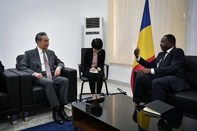 Chadian Prime Minister Allamaye Halina (1st R) meets with Chinese Foreign Minister Wang Yi (1st L), also a member of the Political Bureau of the Communist Party of China Central Committee, in N'Djamena, Chad, on Jan. 8, 2025. (Xinhua/Han Xu)