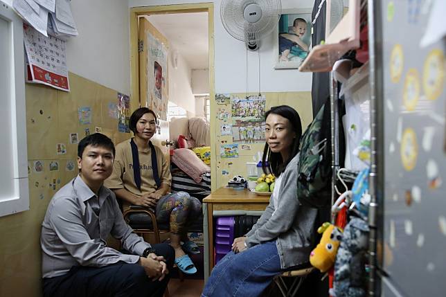 Frank Yau (left), director of Project Space, single mother Chen Xingyan, and Mandy Wong, project manager for Project Space, in Kwun Tong. Photo: Winson Wong