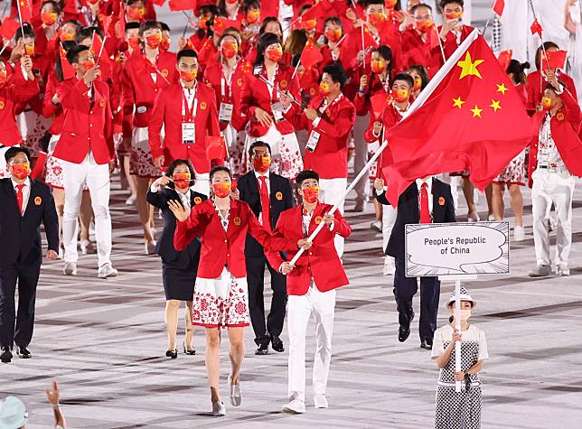 Led by flag bearers Zhu Ting and Zhao Shuai, Olympic delegation of China parade into the Olympic Stadium during the opening ceremony of Tokyo 2020 Olympic Games in Tokyo, Japan, July 23, 2021. (Xinhua/Zheng Huansong)