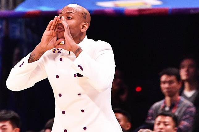 Beijing Royal Fighters coach Stephon Marbury guides his players from the sidelines in the Chinese Basketball Association. Photo: Xinhua