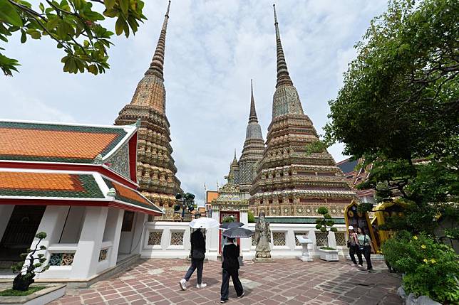 Tourists visit the Wat Pho temple in Bangkok, Thailand, July 30, 2024. (Xinhua/Rachen Sageamsak)