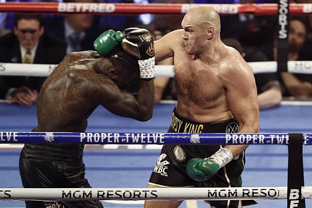 Tyson Fury dominates Deontay Wilder in their heavyweight title fight. Photo: EPA