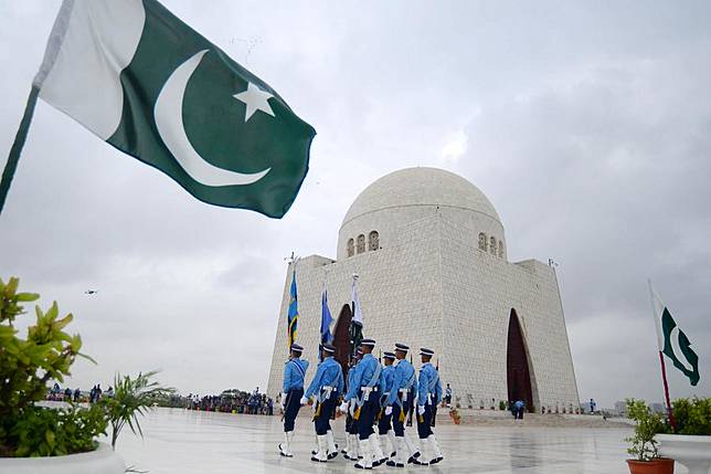 Military personnel march at the mausoleum of the founder of Pakistan Muhammad Ali Jinnah during a ceremony to mark the Defense Day in southern Pakistani port city of Karachi on Sept. 6, 2024.(Str/Xinhua)