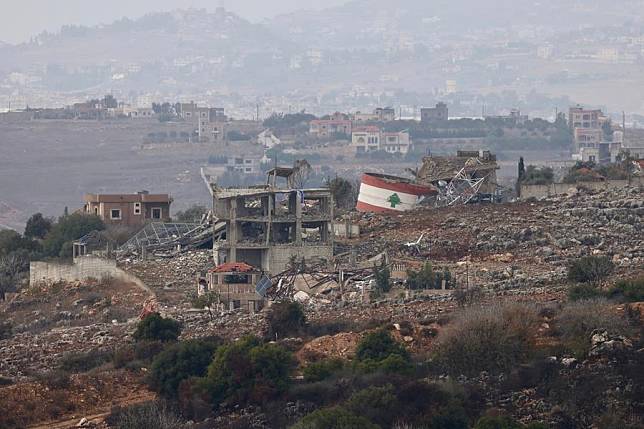 This photo taken from Israel's side of the Israel-Lebanon border on Nov. 27, 2024 shows destroyed buildings in southern Lebanon. (Photo by Jamal Awad/Xinhua)