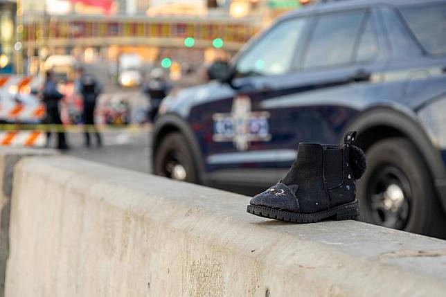 A shoe is seen at the site following a shooting in Kansas City, Missouri, the United States, Feb. 14, 2024. (Photo by Robert Reed/Xinhua)