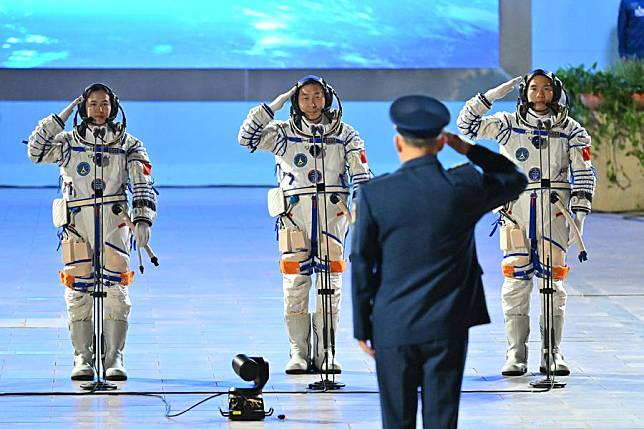 Chinese astronauts Cai Xuzhe (2nd L), Song Lingdong (1st R) and Wang Haoze (1st L) attend a see-off ceremony at the Jiuquan Satellite Launch Center in northwest China on Oct. 30, 2024. (Xinhua/Li Xin)