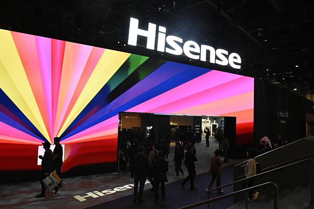 People visit the exhibition area of Chinese company Hisense during the Consumer Electronics Show (CES) 2025 in Las Vegas, the United States, Jan. 7, 2025. (Photo by Zeng Hui/Xinhua)