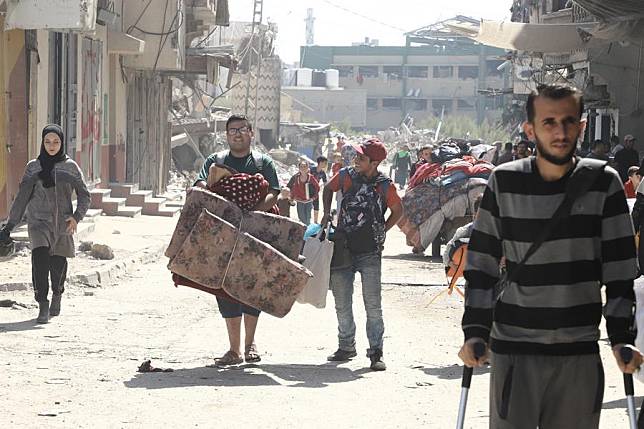 People flee from the northern Gaza Strip city of Jabalia, on Oct. 12, 2024. (Photo by Abdul Rahman Salama/Xinhua)