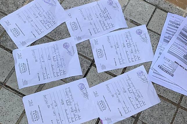 Medical receipts were dropped at Amoy Garden following a scuffle. Photo: Zoe Low