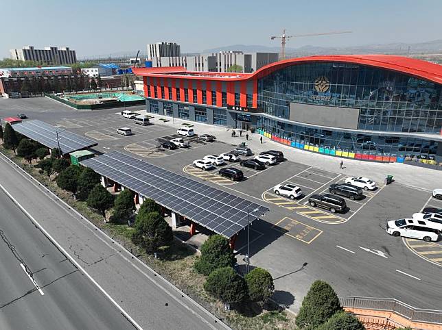 Electric vehicle (EV) charging piles are seen in a highway service area in Taiyuan, north China's Shanxi Province, July 12, 2024. (Xinhua)