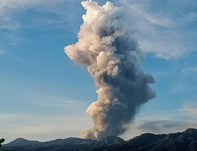 This photo provided by Indonesia's Center for Volcanology and Geological Hazard Mitigation (PVMBG) shows Mount Dukono spewing volcanic material and smoke in Indonesia's North Maluku province on Jan. 3, 2024. (PVMBG/Handout via Xinhua)