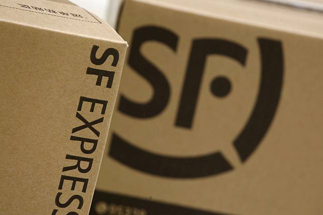 SF Express courier boxes sit at the company's headquarters in Shenzhen. Photo: Reuters