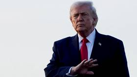 美國總統川普2月13日搭機抵達佛州。路透社