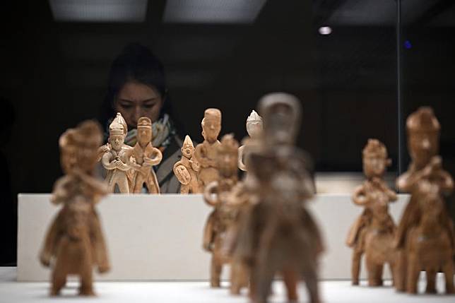 People visit an exhibition at the National Museum of China in Beijing, capital of China, Dec. 3, 2024. (Xinhua/Jin Liangkuai)