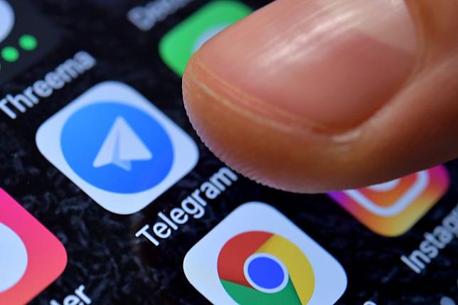 Telegram is a popular app widely used by protesters because of its encrypted messaging function. Photo: EPA-EFE