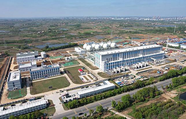 An aerial drone photo taken on April 9, 2024 shows a view of the 300 MW compressed air energy storage station in Yingcheng, central China's Hubei Province. (Xinhua/Cheng Min)