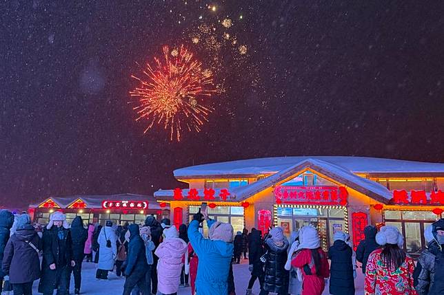 Fireworks are pictured at a snow town scenic area in Hailin City, northeast China's Heilongjiang Province, Dec. 28, 2024. (Xinhua/Yang Siqi)