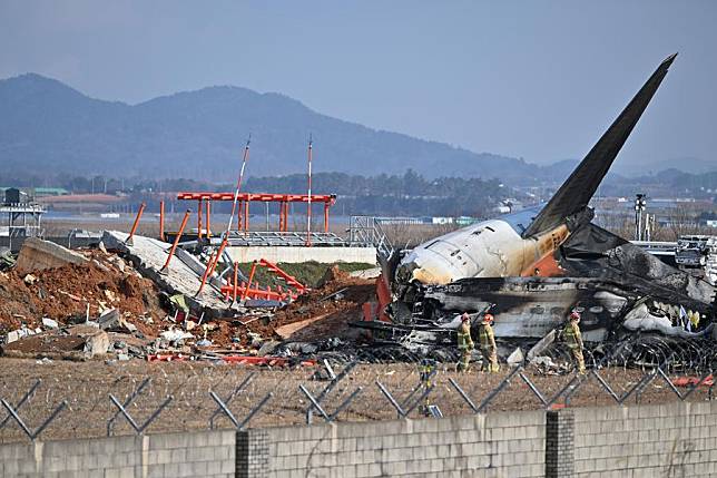 This photo shows the site of an airplane crash at the Muan International Airport, some 290 km southwest of Seoul, South Korea, Dec. 29, 2024. (NEWSIS via Xinhua)