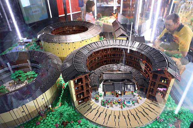 Traditional Fujian earth roundhouses, or tulou, made with thousands of plastic Lego blocks – some of the many miniature Chinese landmarks on display at the Indigo shopping mall in Beijing. Photo: Simon Song