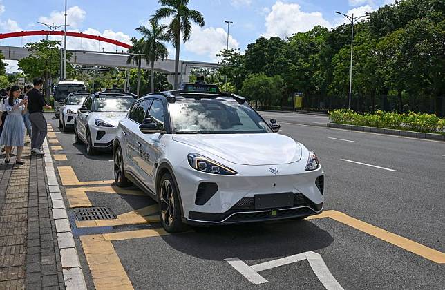 Driverless cabs of &ldquo;Robotaxi,&rdquo; Baidu's online unmanned car-hailing services, wait for passengers in Pingshan District of Shenzhen, south China's Guangdong Province, July 22, 2024. (Xinhua/Li He)