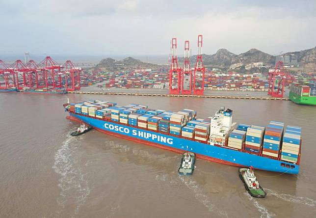 An aerial drone photo shows the &ldquo;Xin Shanghai,&rdquo; a vessel operated by China COSCO Shipping Corporation Limited, approaching Yangshan Port, east China's Shanghai, Dec. 18, 2024. (Xinhua/Fang Zhe)