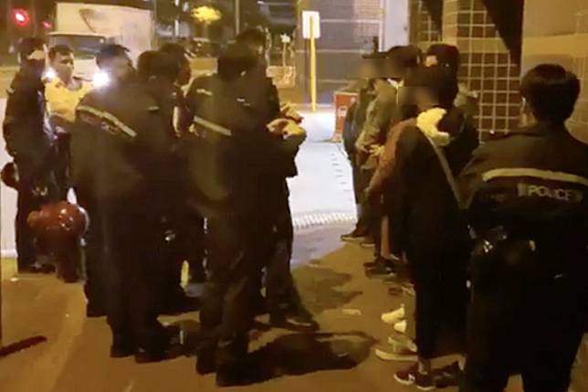 A screen grab from an online video shows eight people being detained by police in Tuen Mun. Photo: Facebook