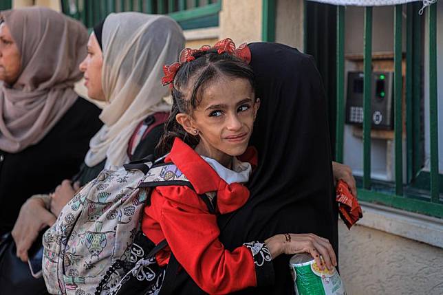 A Palestinian child with cancer waits to leave for treatment abroad at the Nasser Medical Complex in the southern Gaza Strip city of Khan Younis, on June 27, 2024. (Photo by Rizek Abdeljawad/Xinhua)