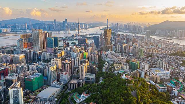 An aerial drone photo taken on July 8, 2024 shows a view of Macao, Hengqin and Zhuhai in south China. (Xinhua/Cheong Kam Ka)