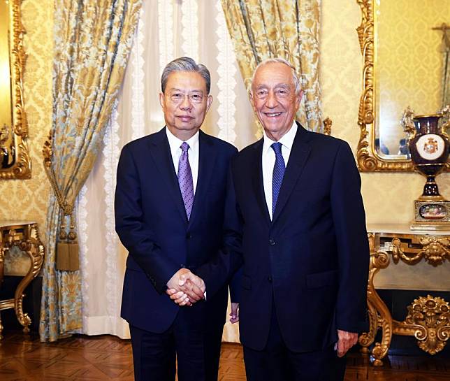 Zhao Leji, chairman of the National People's Congress Standing Committee, meets with Portuguese President Marcelo Rebelo de Sousa in Lisbon, Portugal, Nov. 21, 2024. (Xinhua/Liu Weibing)