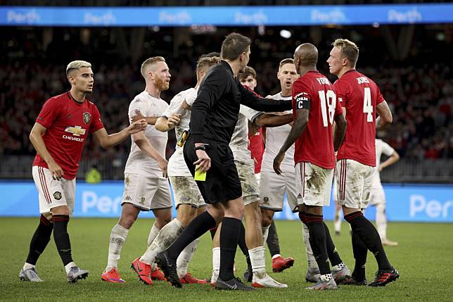Players from Manchester United and Leeds United scuffle during their friendly match. Photo: AP